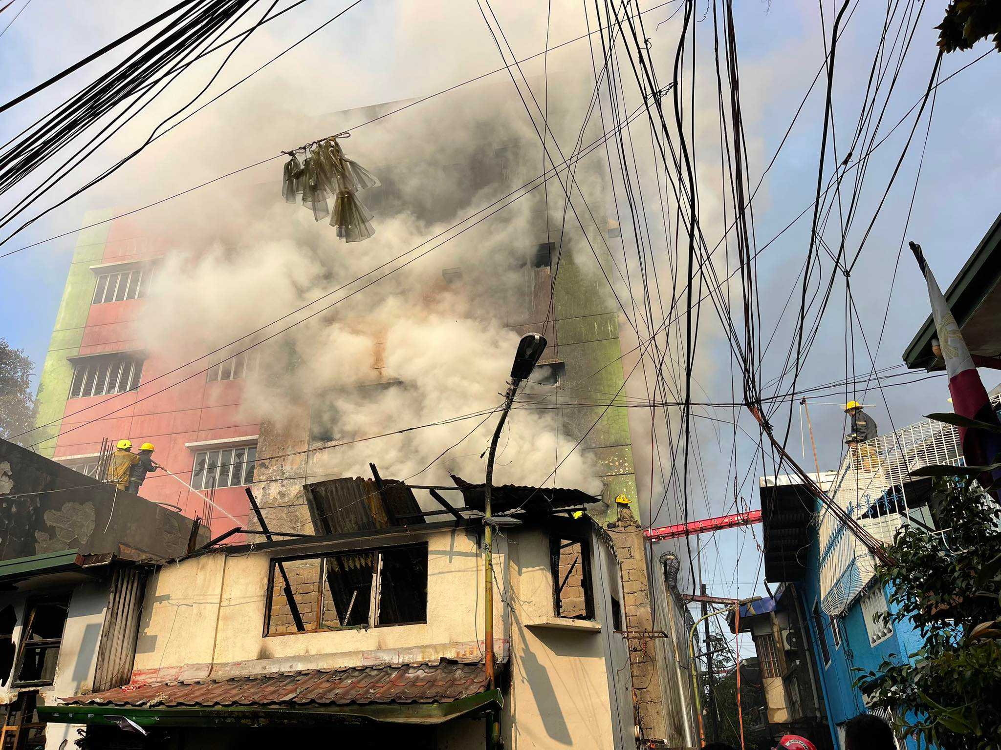 Fire hits residential area in Tondo, Manila; neighboring garment factory razed