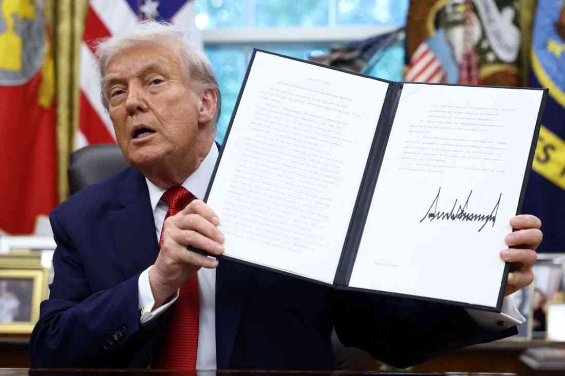 Trump signs order declaring TikTok sale ready and values it at $14 billion