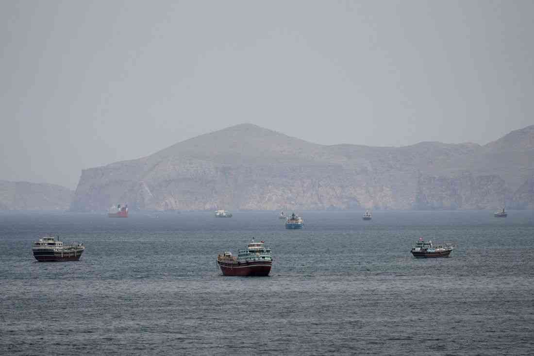 Iran shows off its control over strait, Israel warns of further attacks