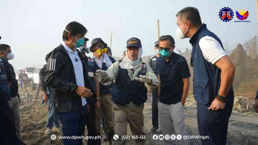 Dizon, Japan Disaster Relief Team examine Navotas Landfill amid 18-day fire