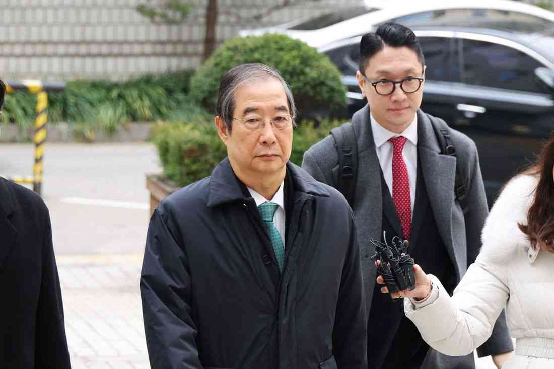 South Korea appeals court cuts jail term for ex-PM Han to 15 years in martial law case