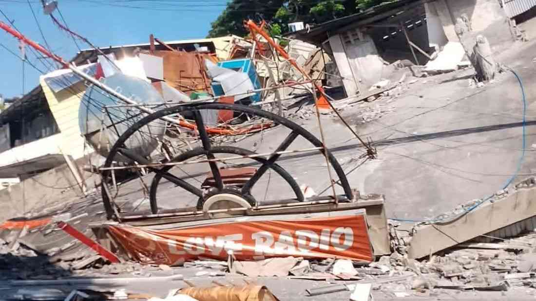 Building in GenSan housing Love Radio, DZRH stations collapses in magnitude 7.8 quake