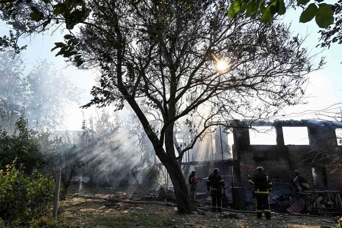 Russian and Ukrainian attacks kill at least 13, officials say
