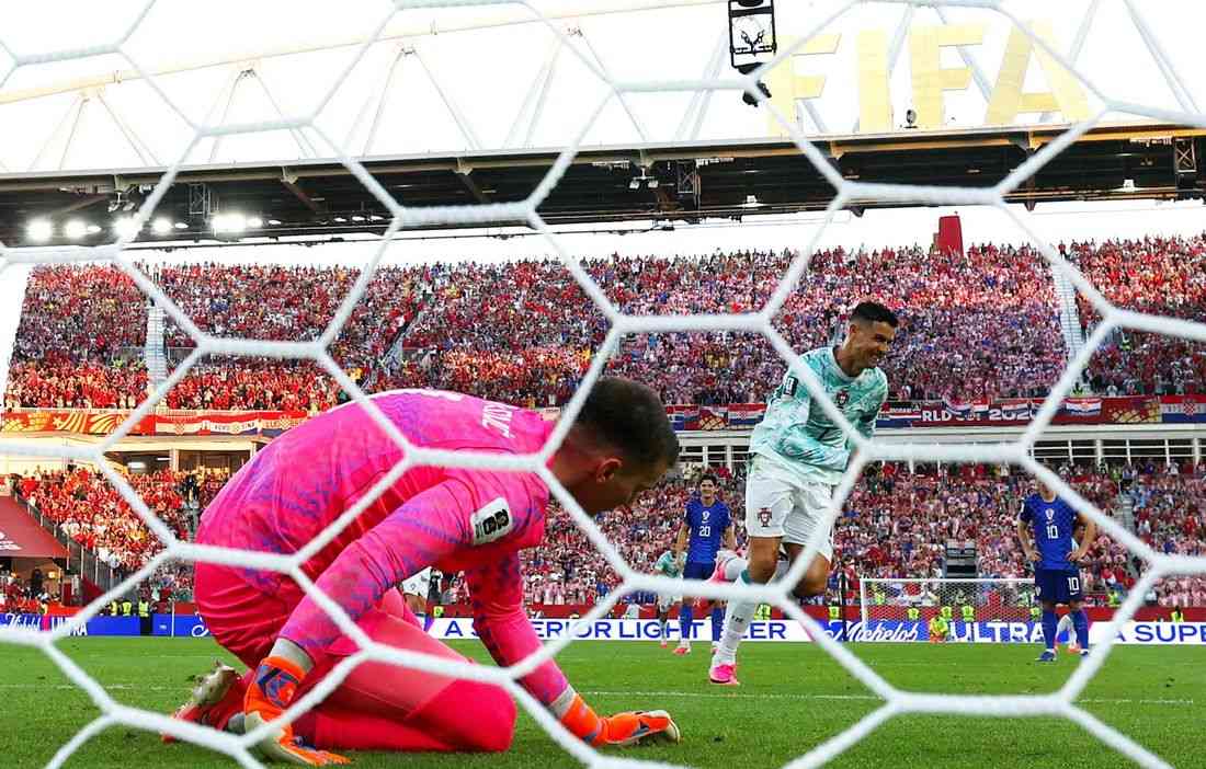 Soccer-Portugal survive late drama to beat Croatia and reach World Cup last 16