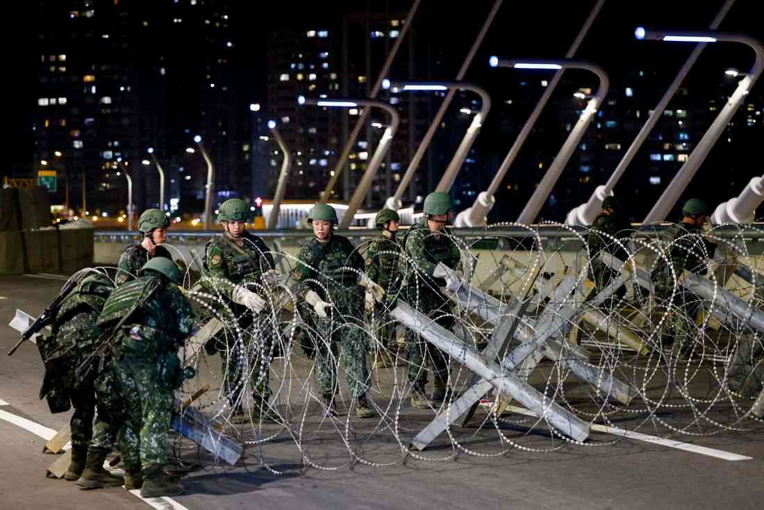 Taiwan troops rehearse sealing off key bridge at strategic chokepoint during war games