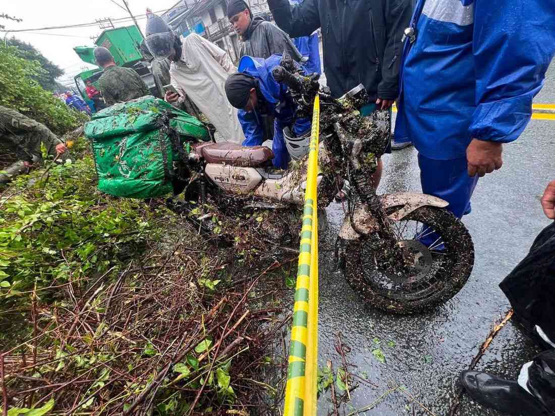 Tree, utility pole fall on delivery rider amid heavy Habagat downpour, victim dies