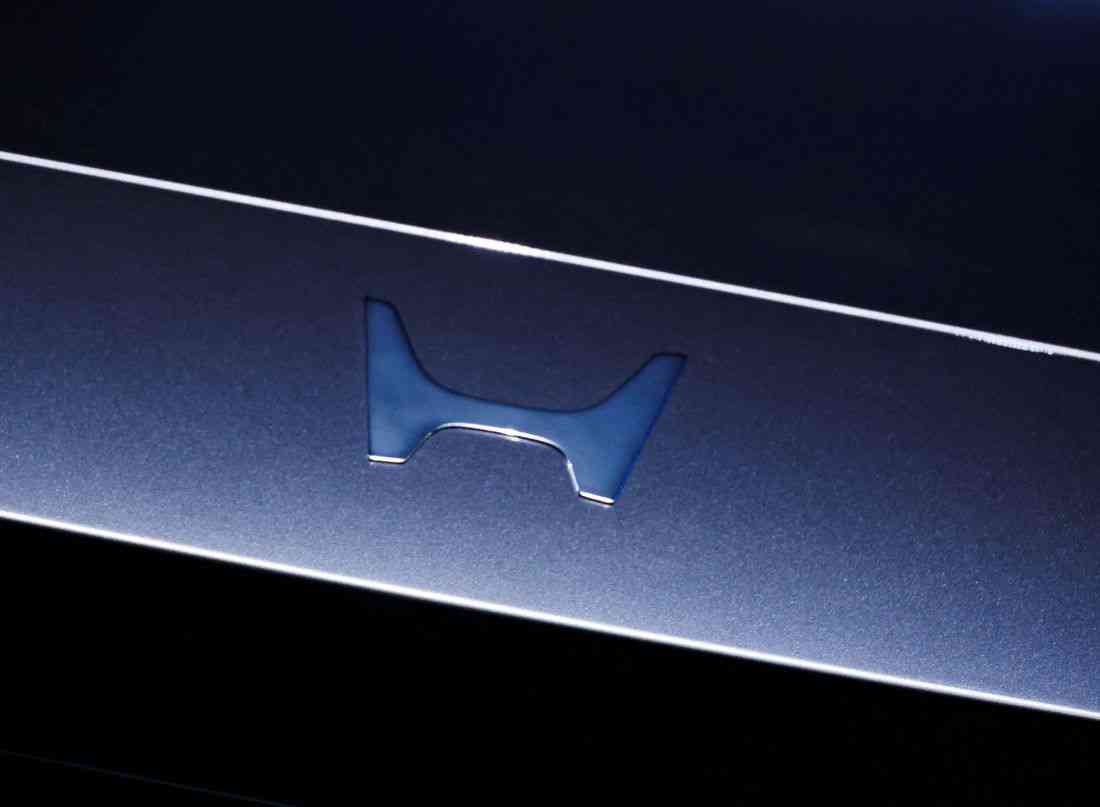 Honda raises full-year forecasts, posts first profit rise in six quarters