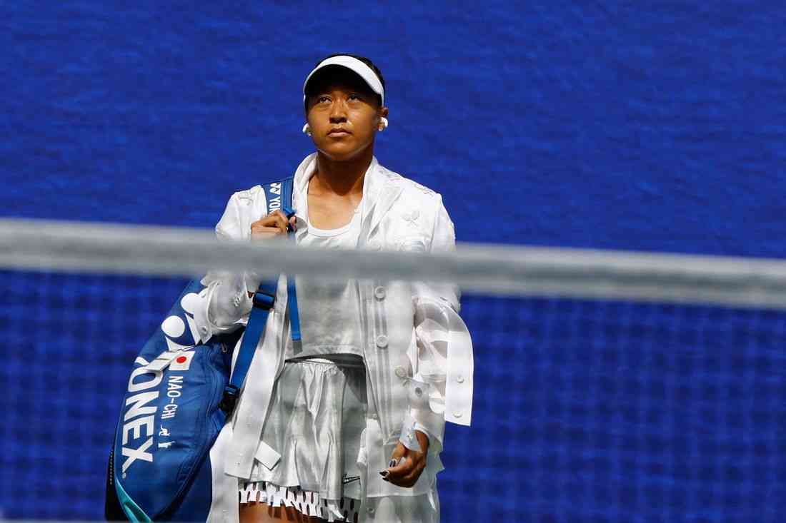 Tennis-Osaka holds her nerve to reach US Open third round