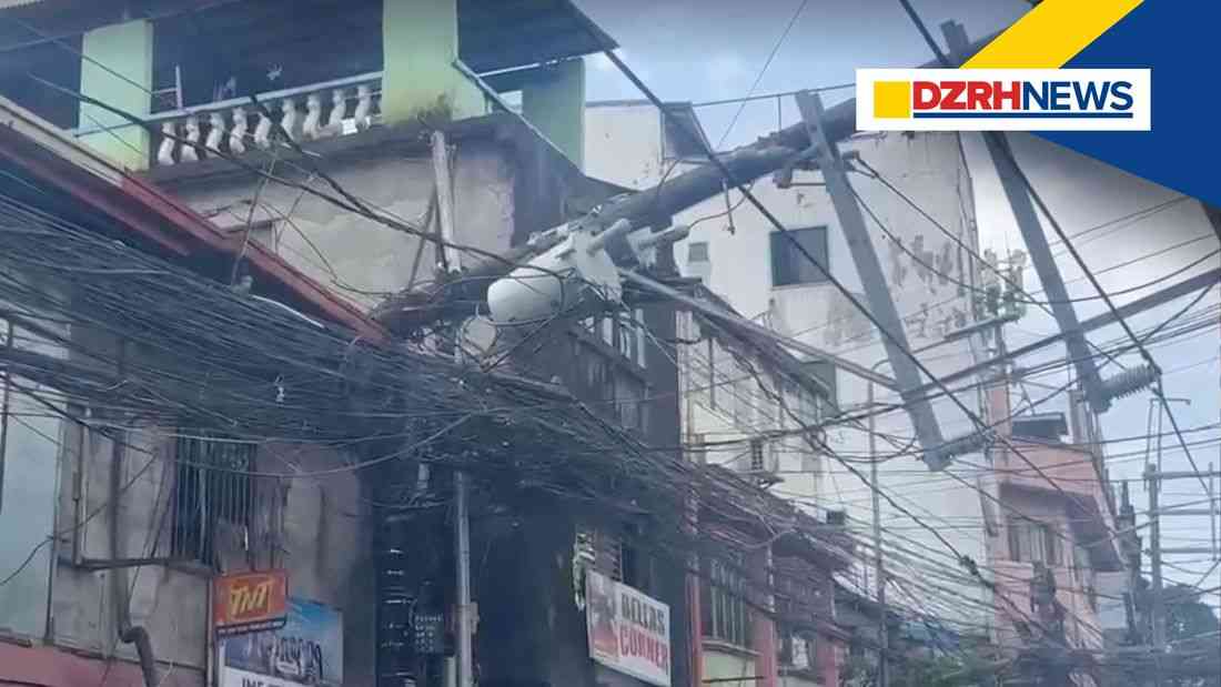 Strong winds knock down power pole, damages house in Pasay City
