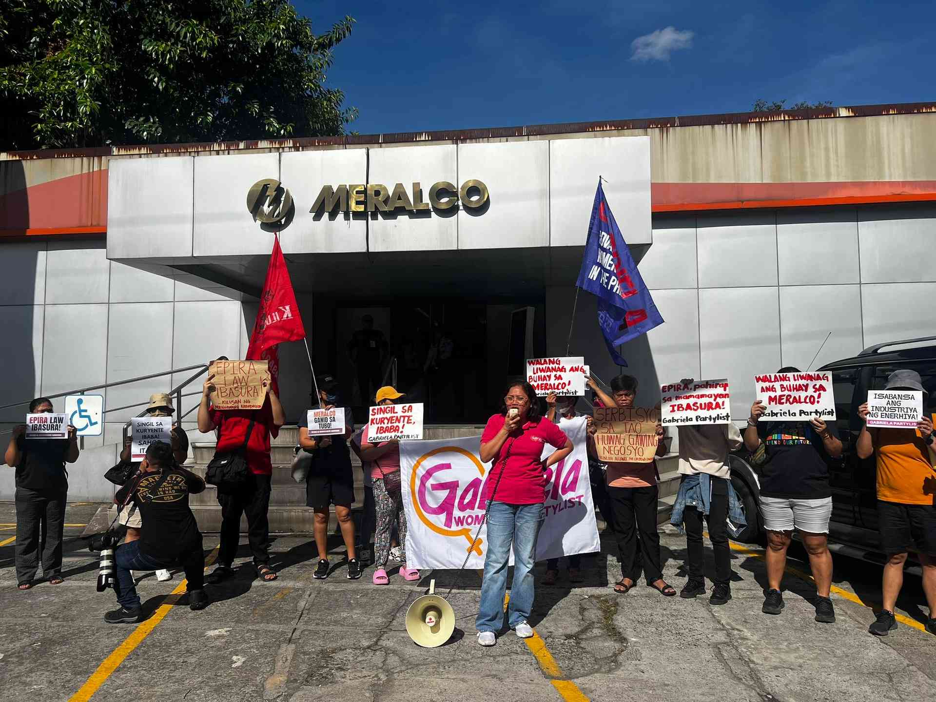 Women's group conducts protest in front of Meralco to denounce rising electricity rate
