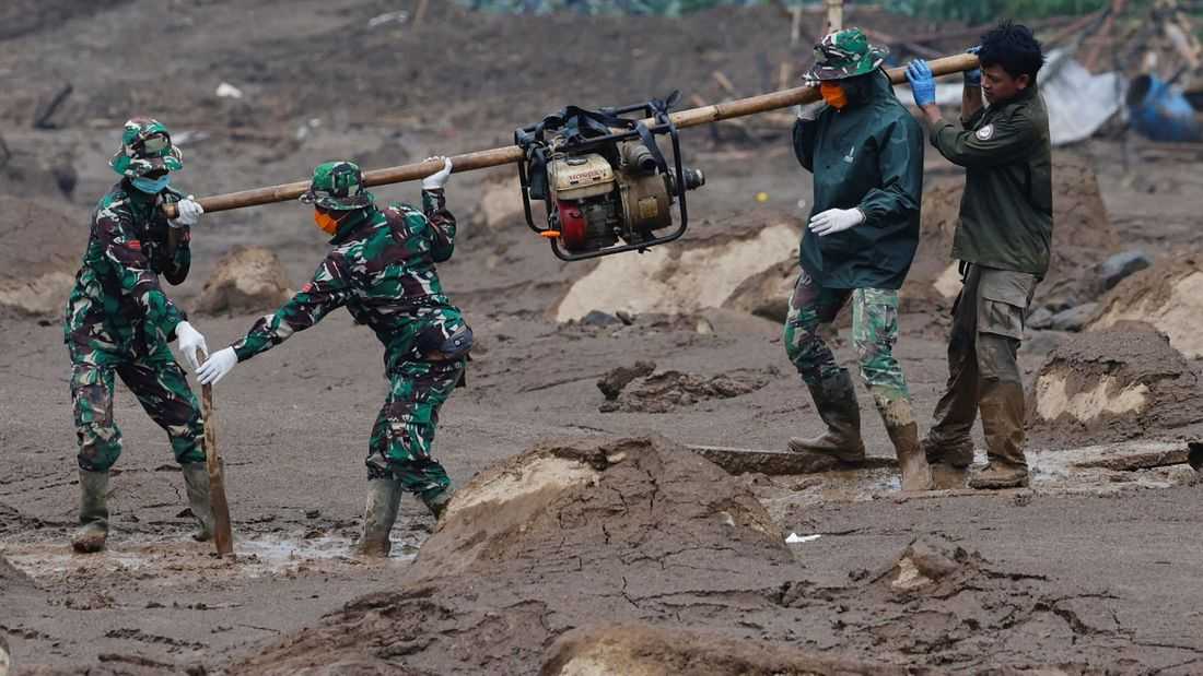 Search for 32 missing in Indonesia landslide hampered by rain as death toll rises to 34