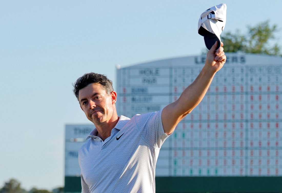 Golf-McIlroy takes historic six-shot Masters lead into weekend