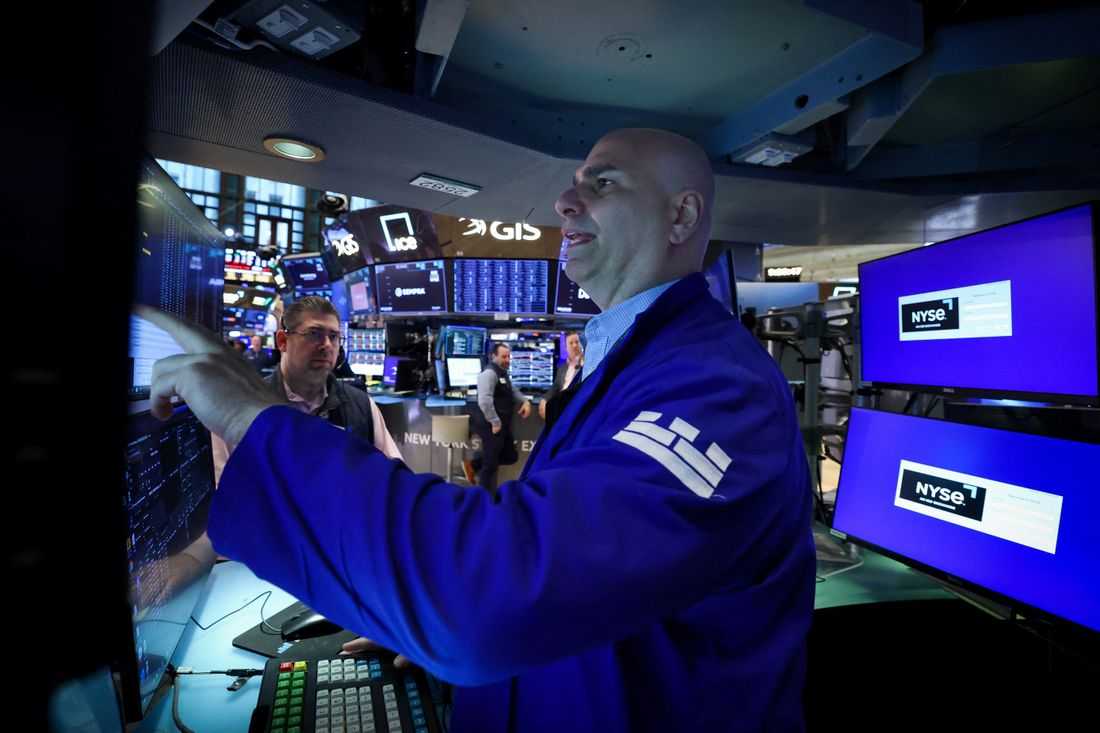 Equities gain, oil settles higher as investors watch US-Iran standoff