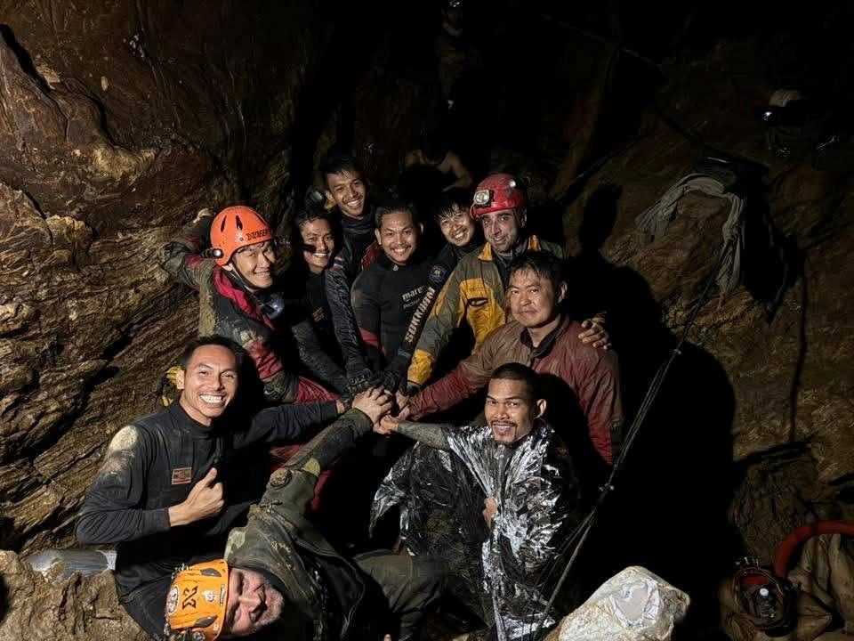 Rescuers pull first trapped person from flooded Laos cave
