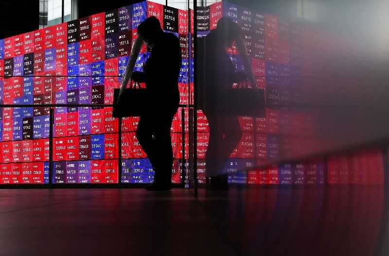 Stocks skid in Asia, bonds buckle as oil climbs