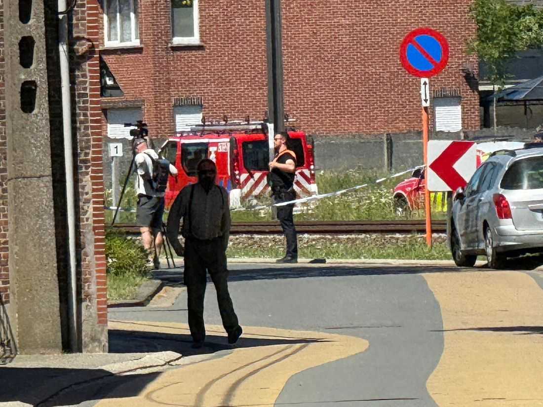Train collides with school van in Belgium, killing four