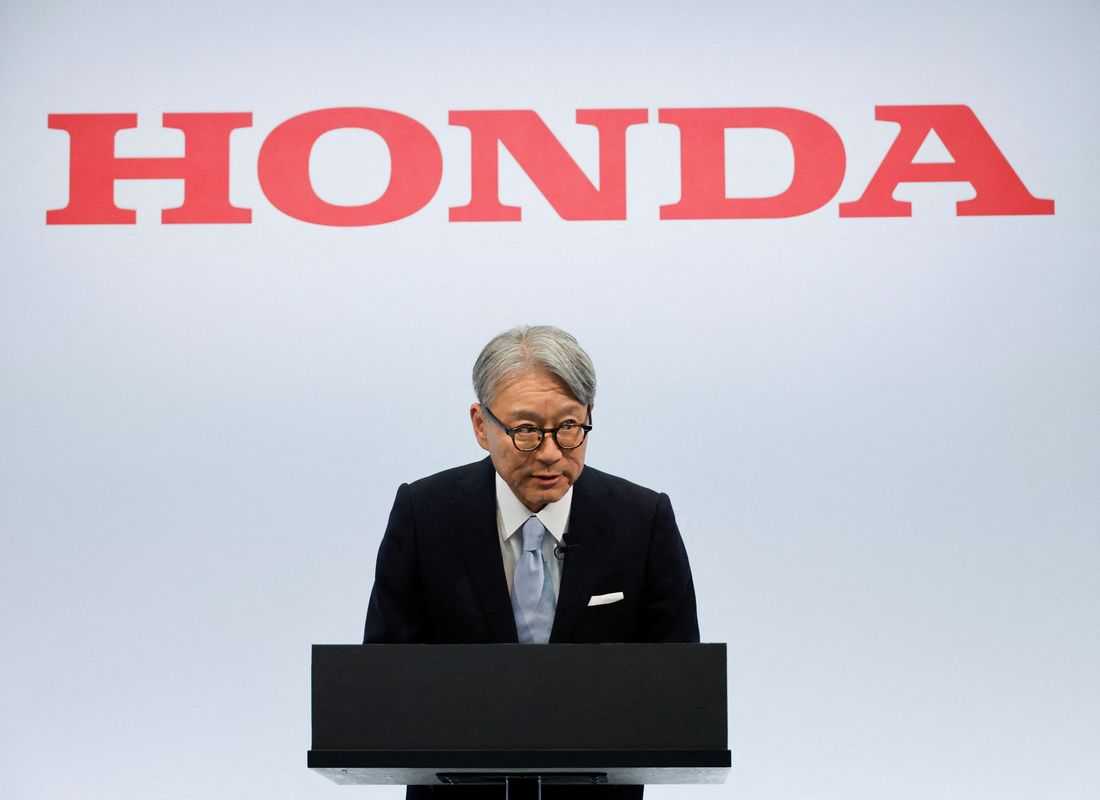Honda CEO apologises for company's loss, wins investor backing at annual meeting