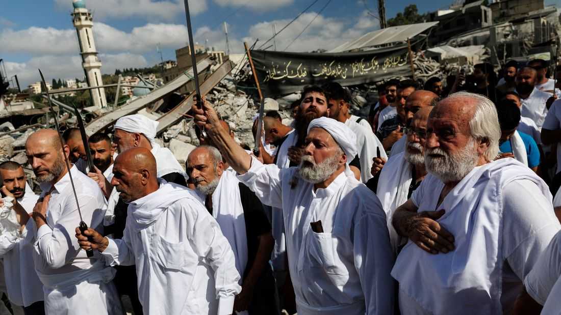 Shi'ite Muslims mark their holiest day in war-battered Lebanon
