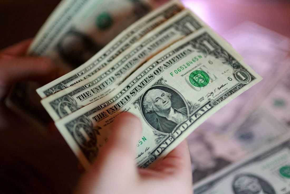 Dollar hits one-month high on lingering chances of Fed hike