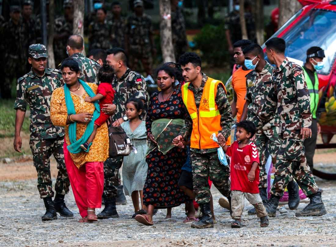 Nepal teams seek hundreds trapped in hydropower tunnels after deadly floods