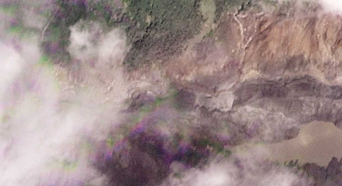 Lake formed by landslide on Nepal-Tibet border overflows, halting rescue work