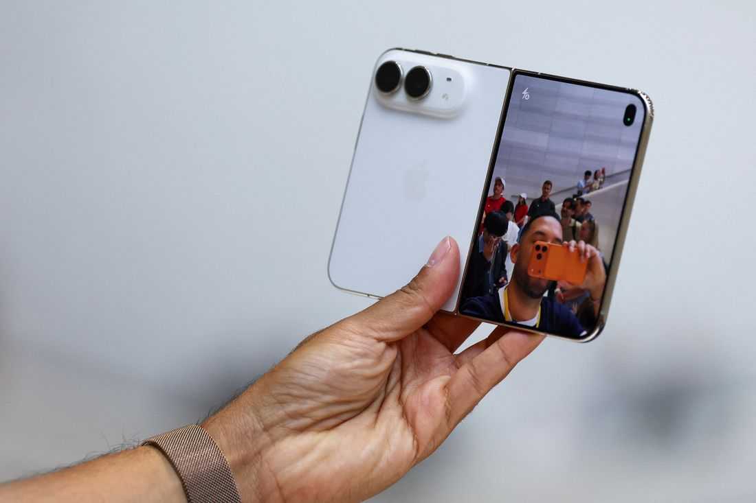 Apple joins foldable phone race with $1,999 passport-shaped iPhone Duo