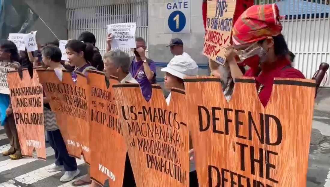 Environmental defenders rally at Camp Crame to denounce alleged ‘fabricated cases’ by PNP