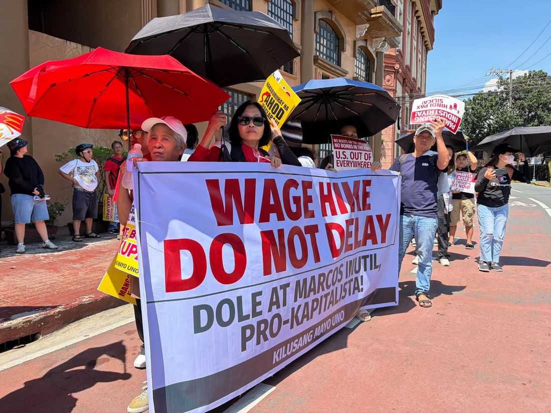 Protesters gather at DOLE office, children in tow