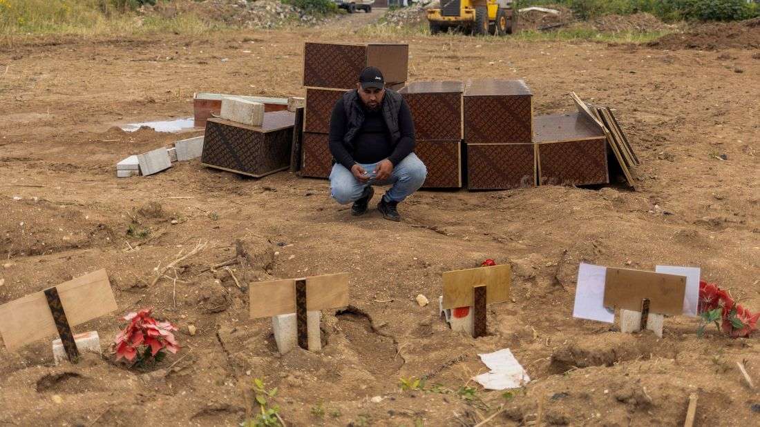 Lebanese man scours home bombed by Israel for mementos of his slain family