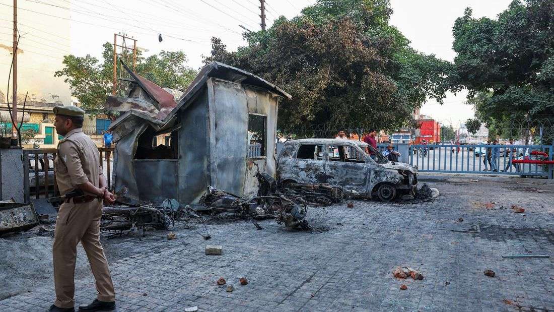 Police fire tear gas as workers' protest in India's Noida turns violent