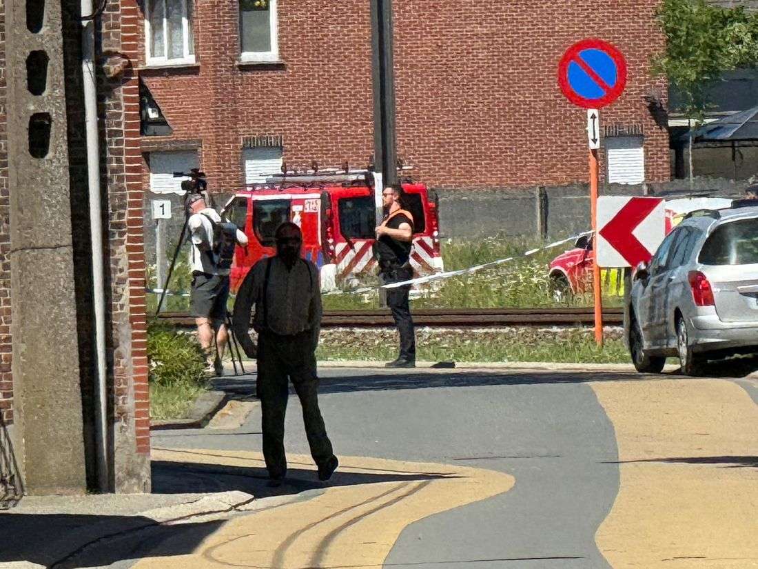 Train collides with school van in Belgium, killing four