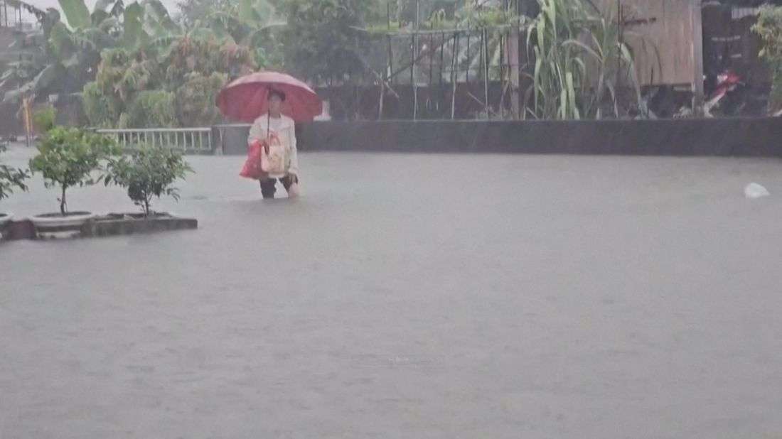 Torrential rain from passing storm shuts down parts of Taiwan and Japan