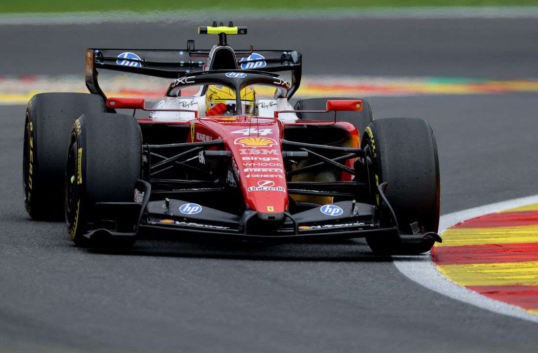 Motor racing - Hamilton cleared of blame after his car knocked over mechanic
