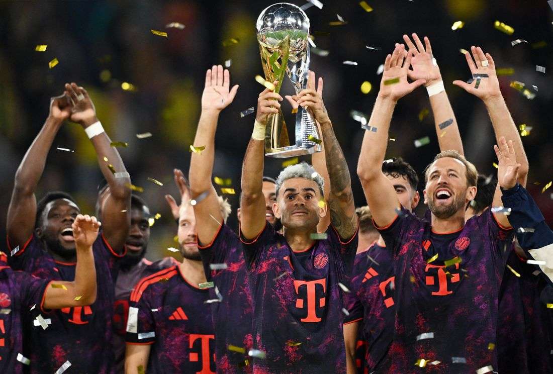 Soccer-Bayern battle past Dortmund 2-1 to win German Supercup