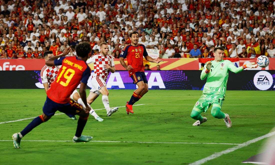 Soccer-Lamine nets double as Spain win again and England beat 10-man Czechs