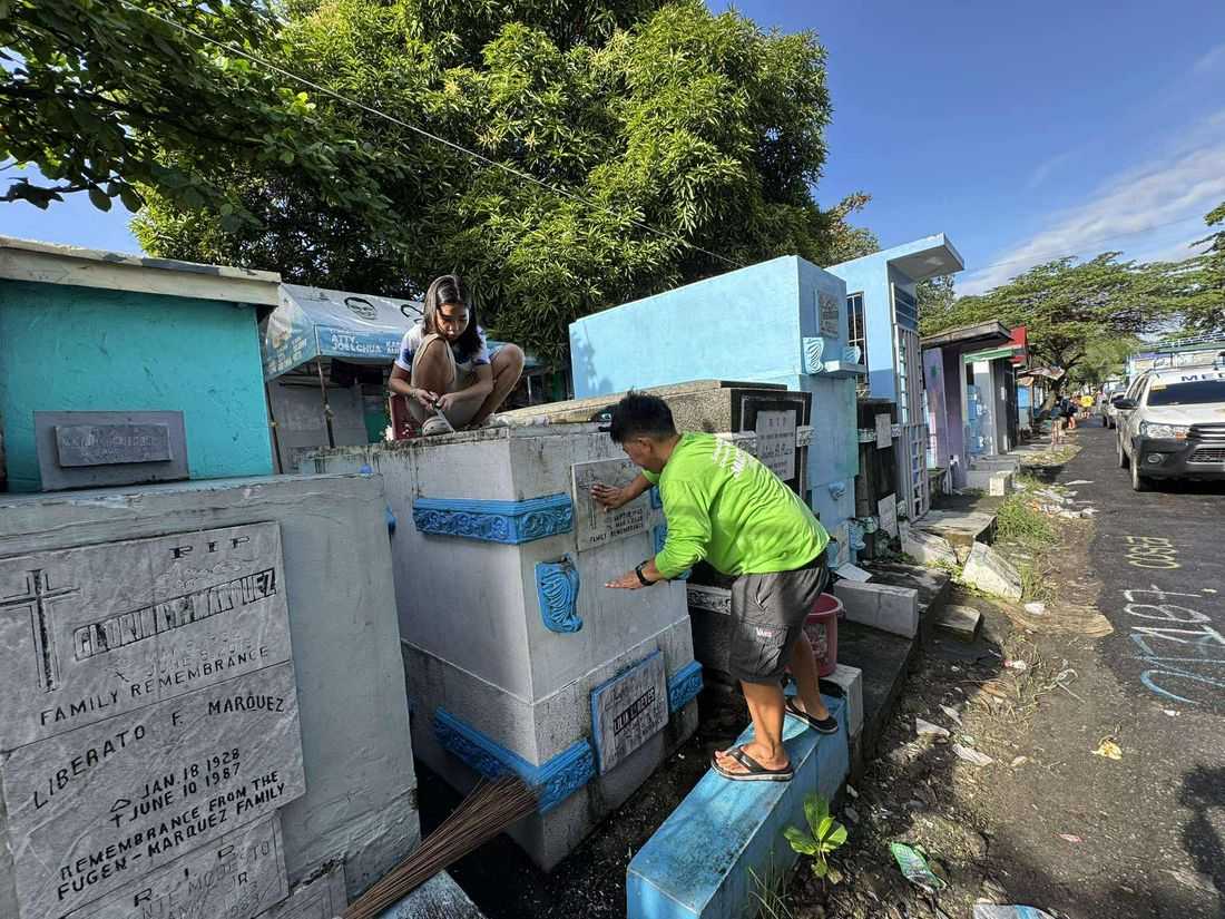 Families flock to Manila North Cemetery to clean graves ahead of Undas 2025