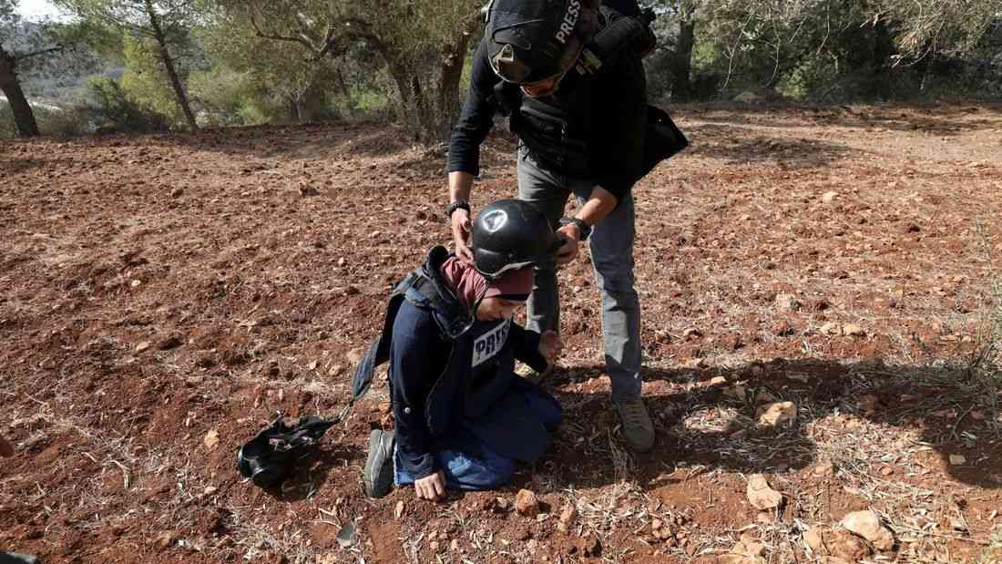 Israeli settlers attack Palestinians, journalists at West Bank olive harvest, witnesses say