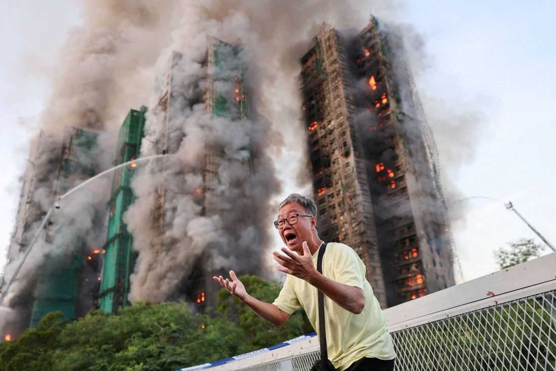 Hong Kong tower fire toll rises to 128, more arrests made