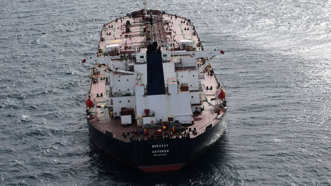 Oil slips on oversupply worries, sanctions risk in focus