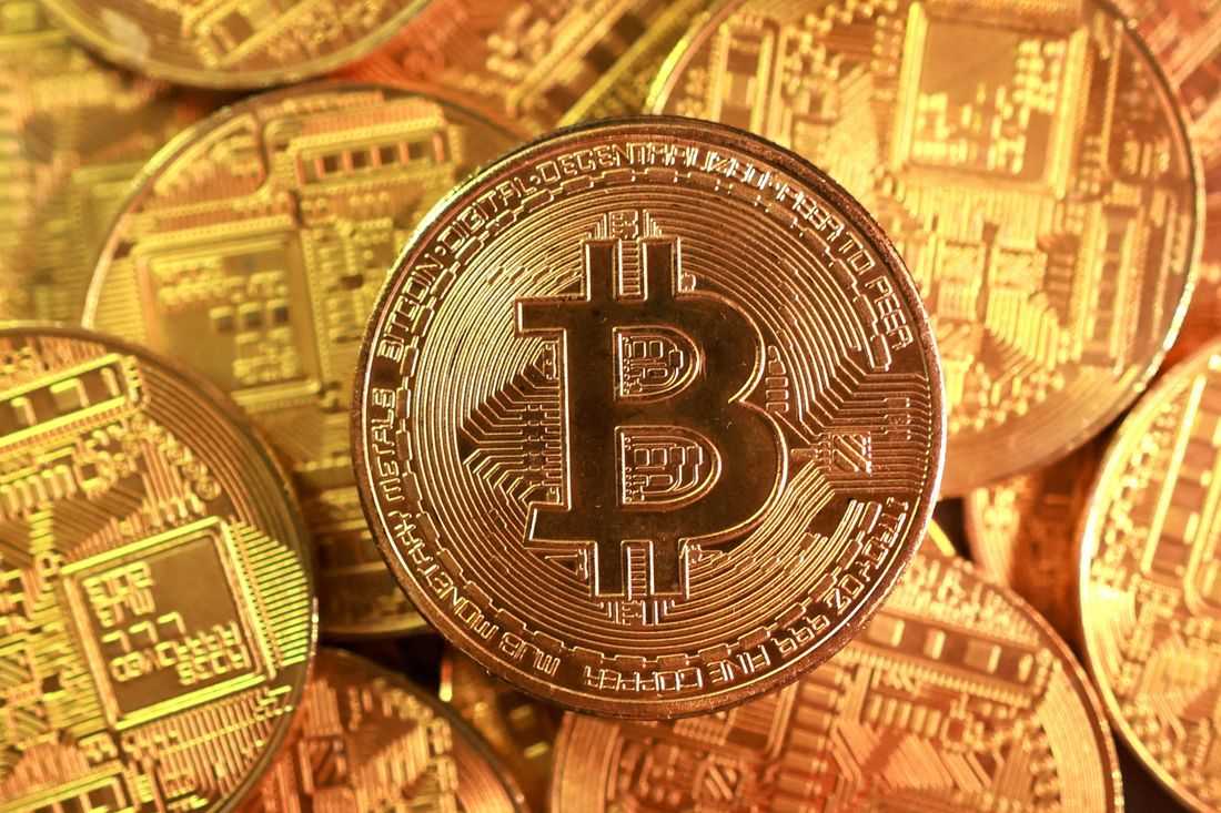 Bitcoin sinks to six-month low as risk-off sentiment persists