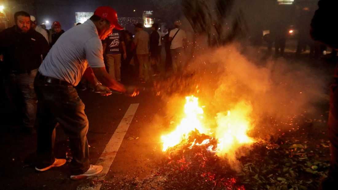 Honduran election turmoil grows as president decries 'electoral coup'
