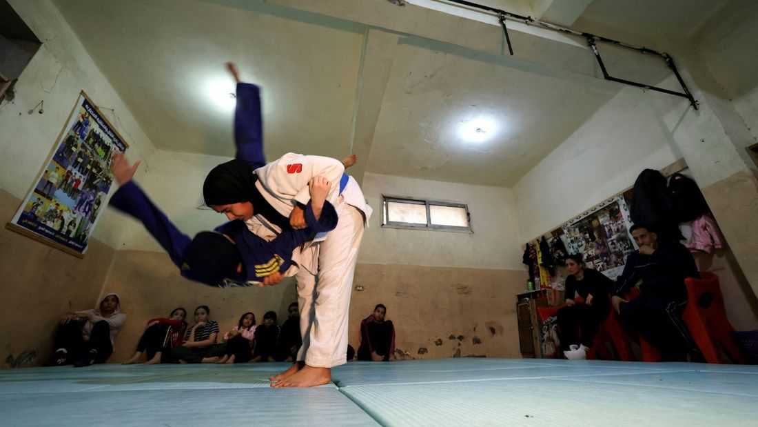 In a tiny hall far from Cairo, a club forges Egyptian girls' Olympic wrestling dreams