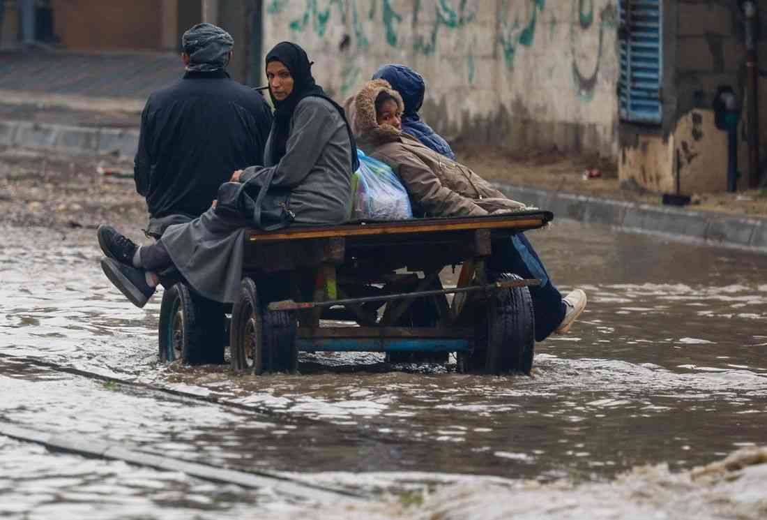 Torrential rain flooded Gaza tents and a baby died of exposure, medics say