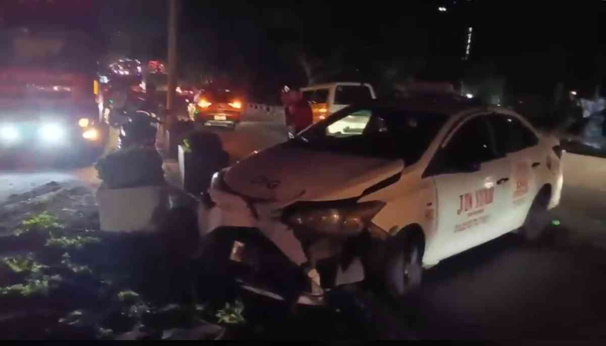 Taxi crashes into plant box on Buendia Flyover; delivery van nearly falls off