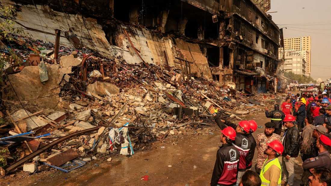 Rescue workers clearing Karachi inferno ruins, 63 missing feared dead