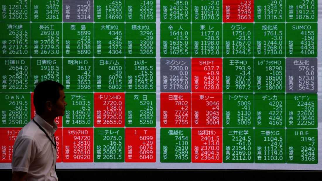 Stocks trade cautiously in Asia, Brent off six-month top