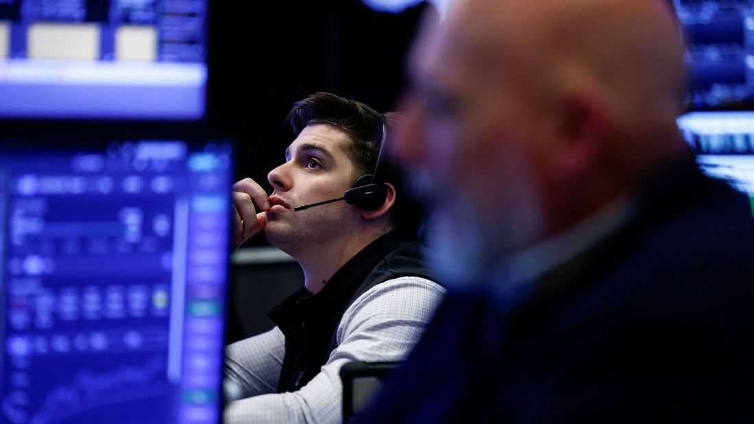 Global stocks hold gains after Fed decision, oil prices rise