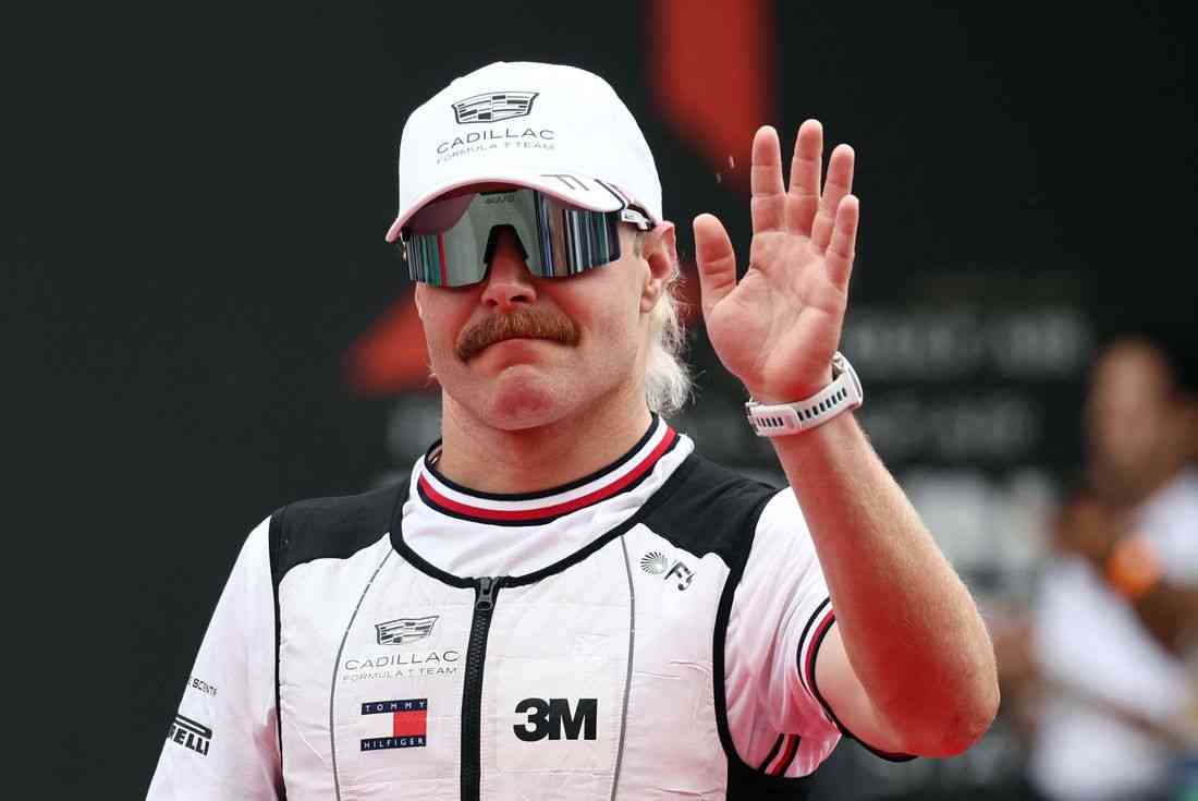 Motor racing-F1 driver Bottas pedalling from Malaysia to Singapore GP
