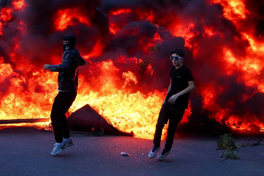 Banks, buildings burn as Albania's capital Tirana erupts into student violence