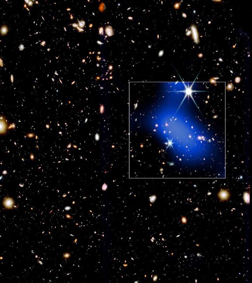Galaxy cluster observed forming surprisingly early in universe's history